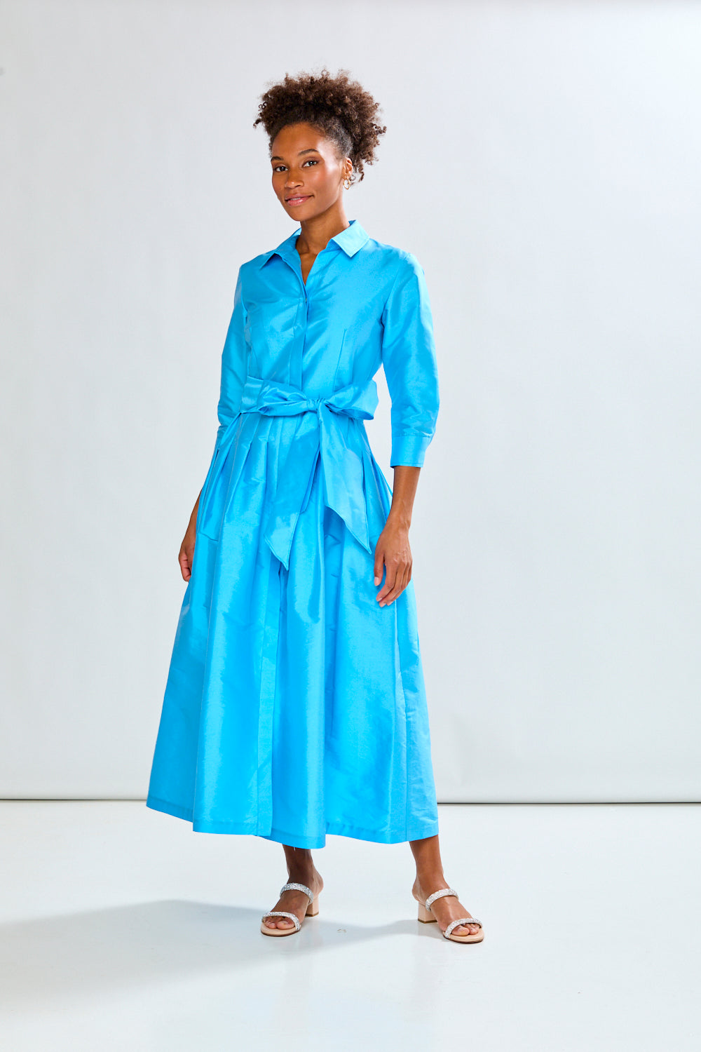 Woman in capri long taffeta dress