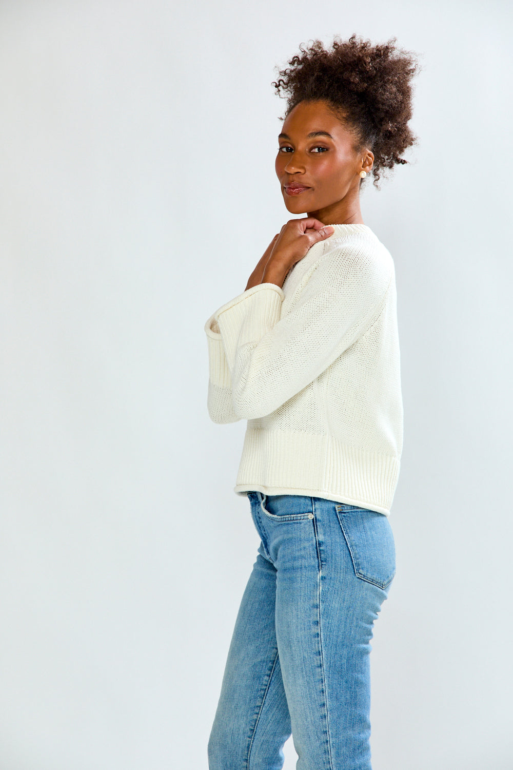 Girl in sand sweater