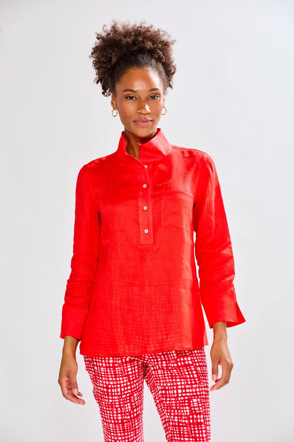 Tomato colored shirt on a women