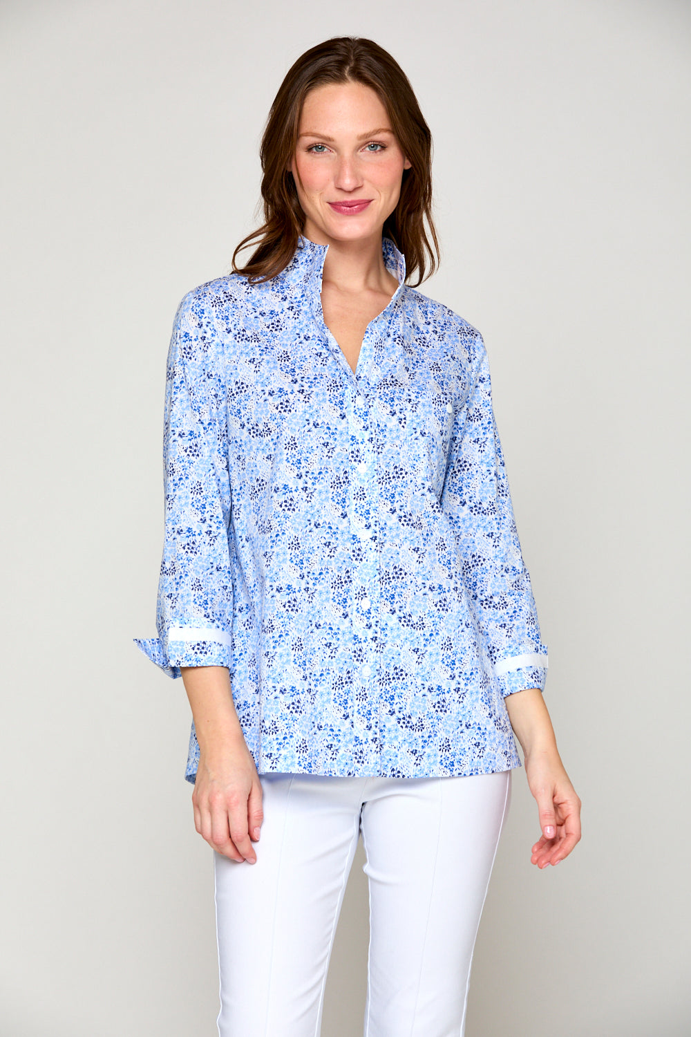 Woman in blue floral top