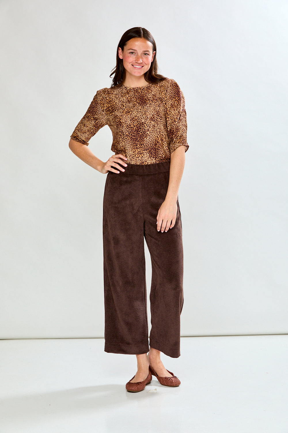 Woman in leopard print top