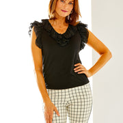 Woman in black sleeveless blouse