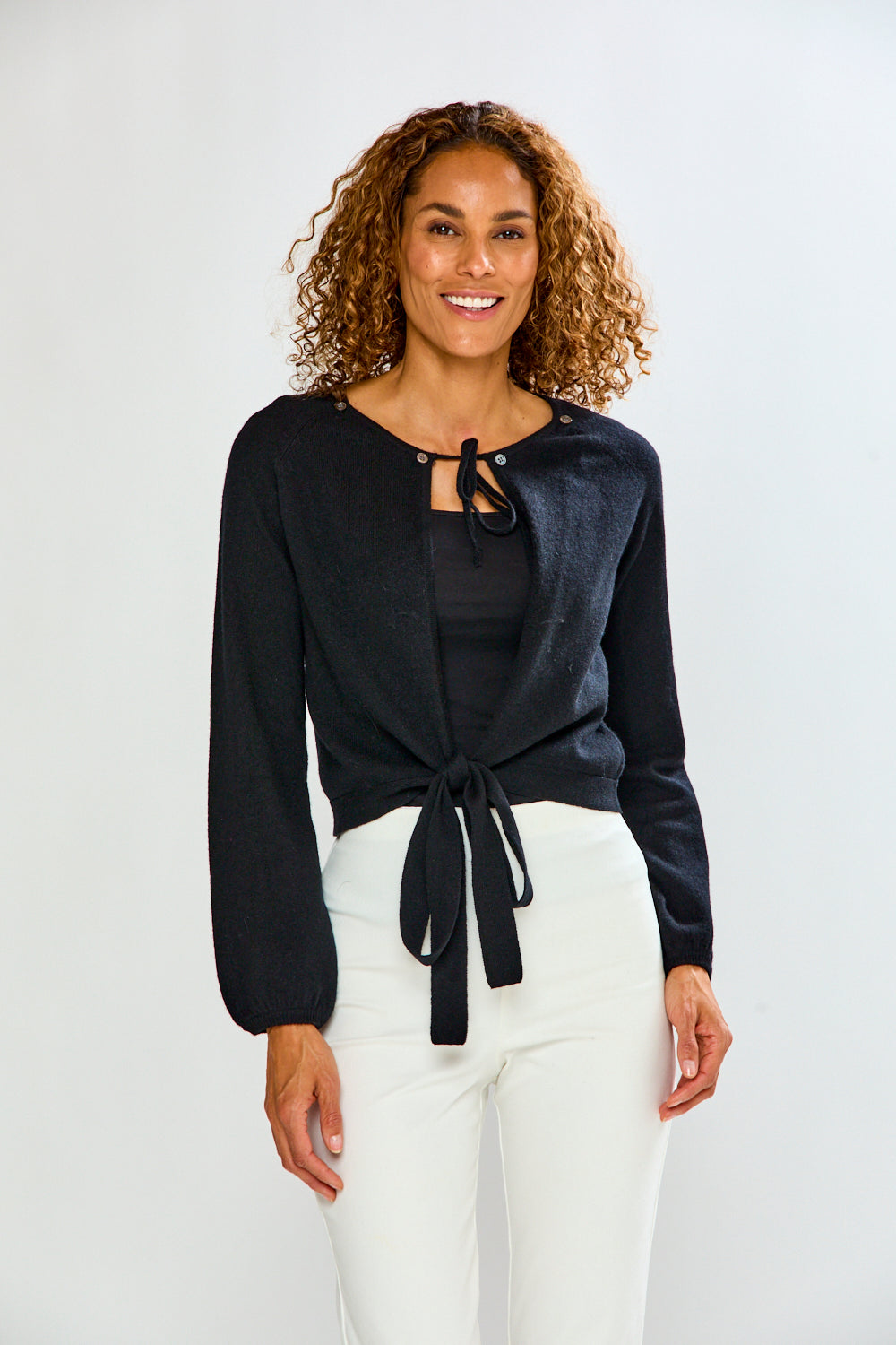 woman in black feather sweater 
