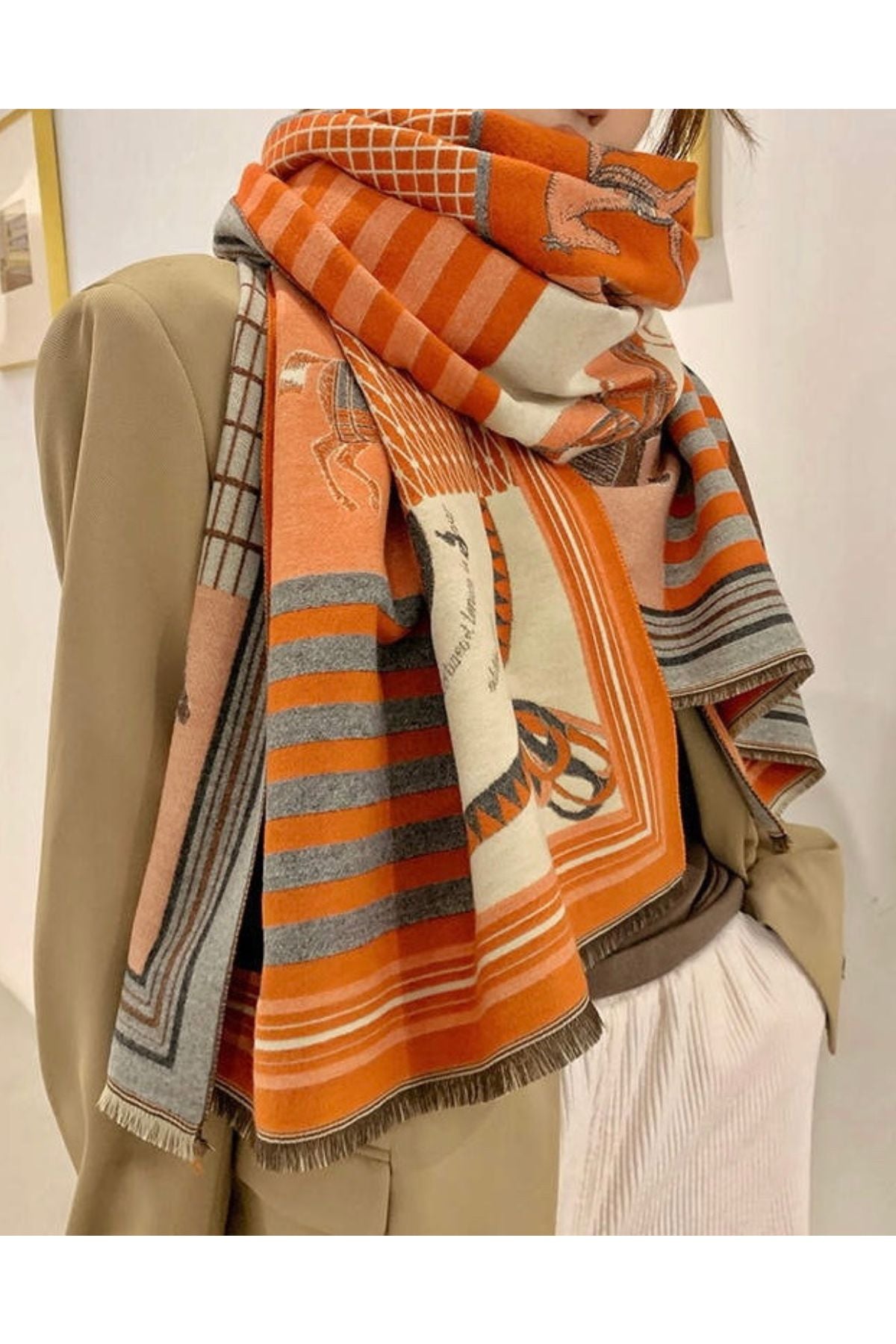 Woman in orange equestrian scarf