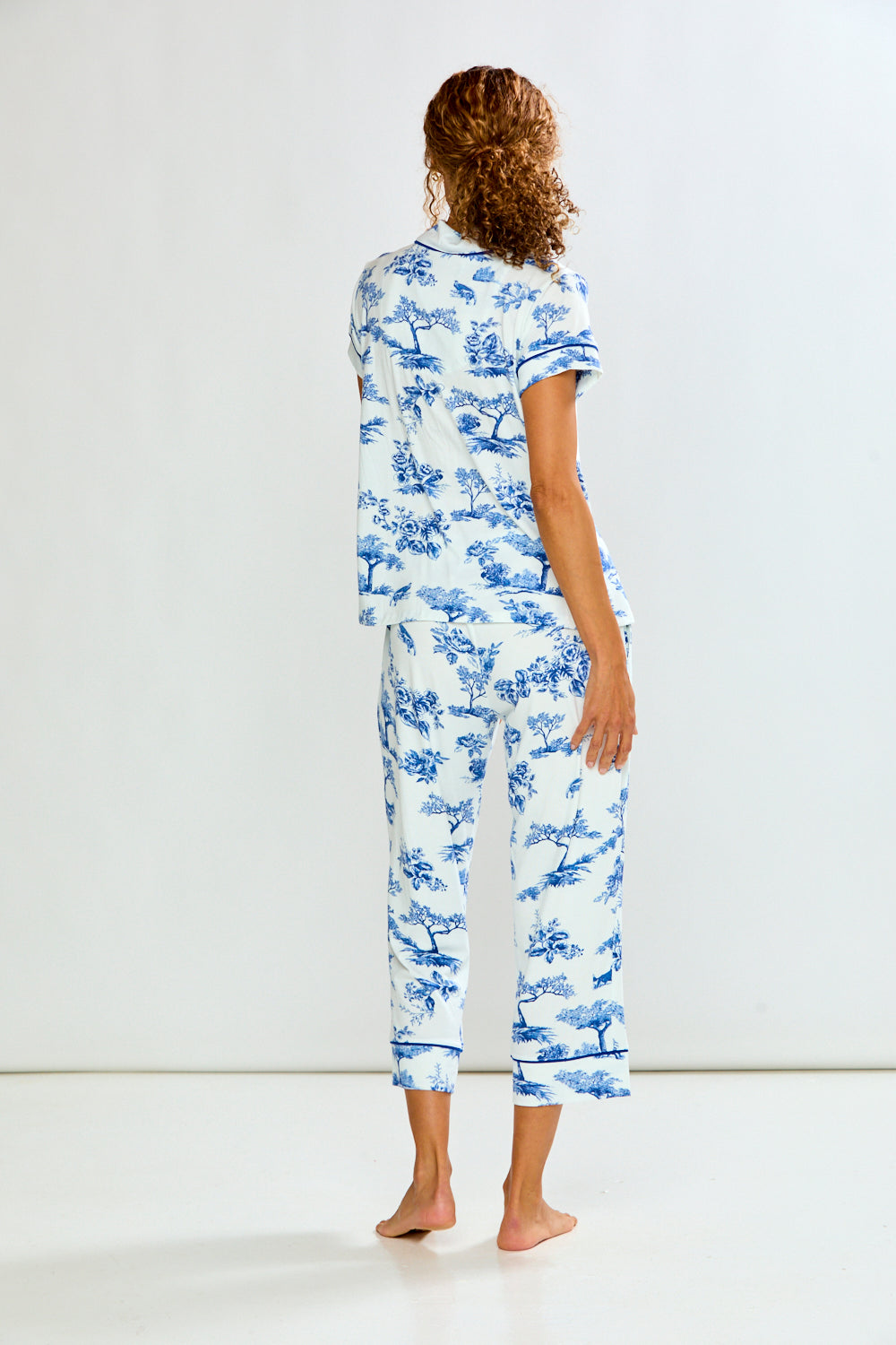 WOMAN IN MATCHING PAJAMA SET