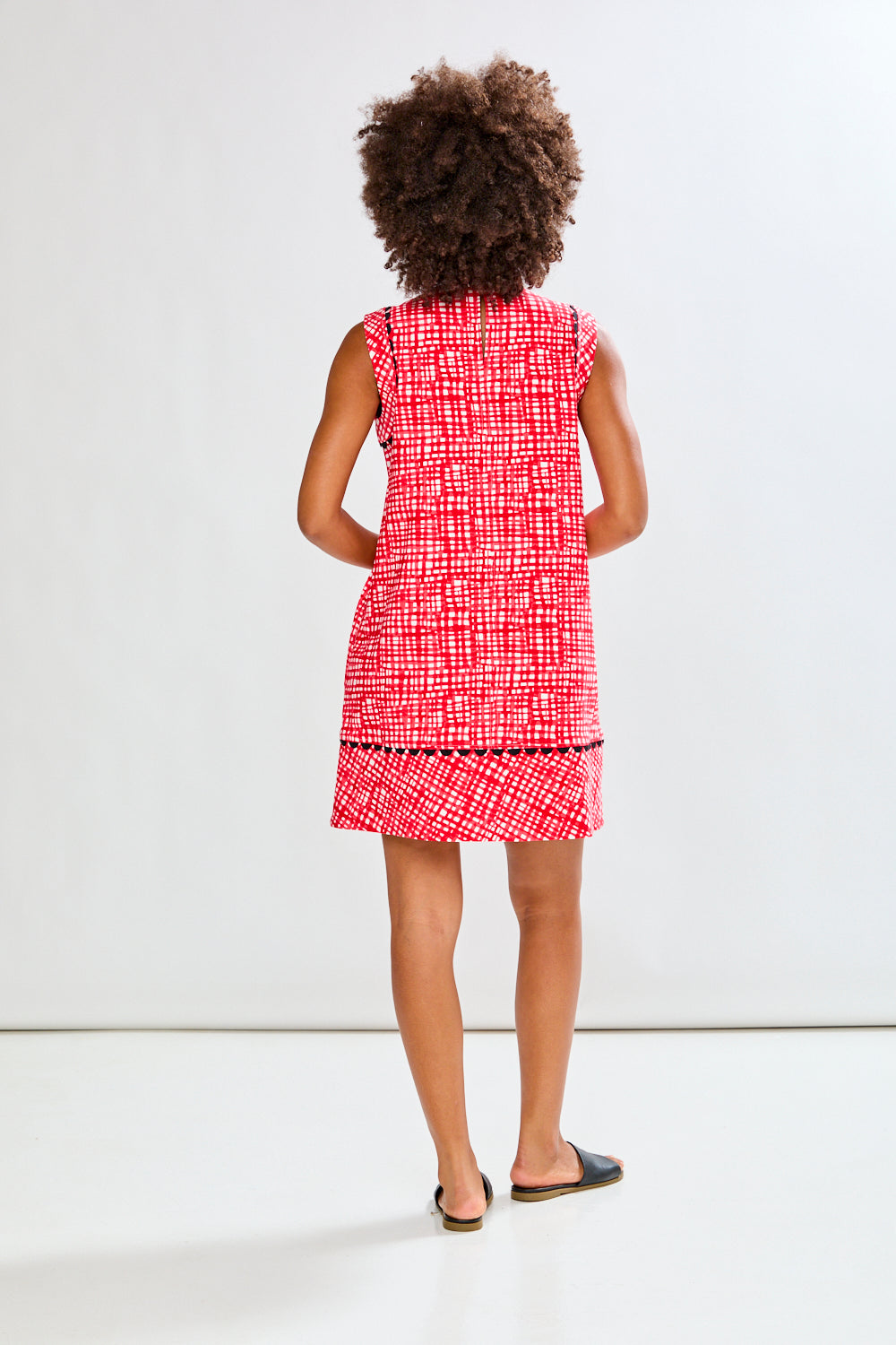 Woman in red patterned dress
