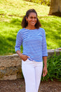Woman in royal blue stripe shirt