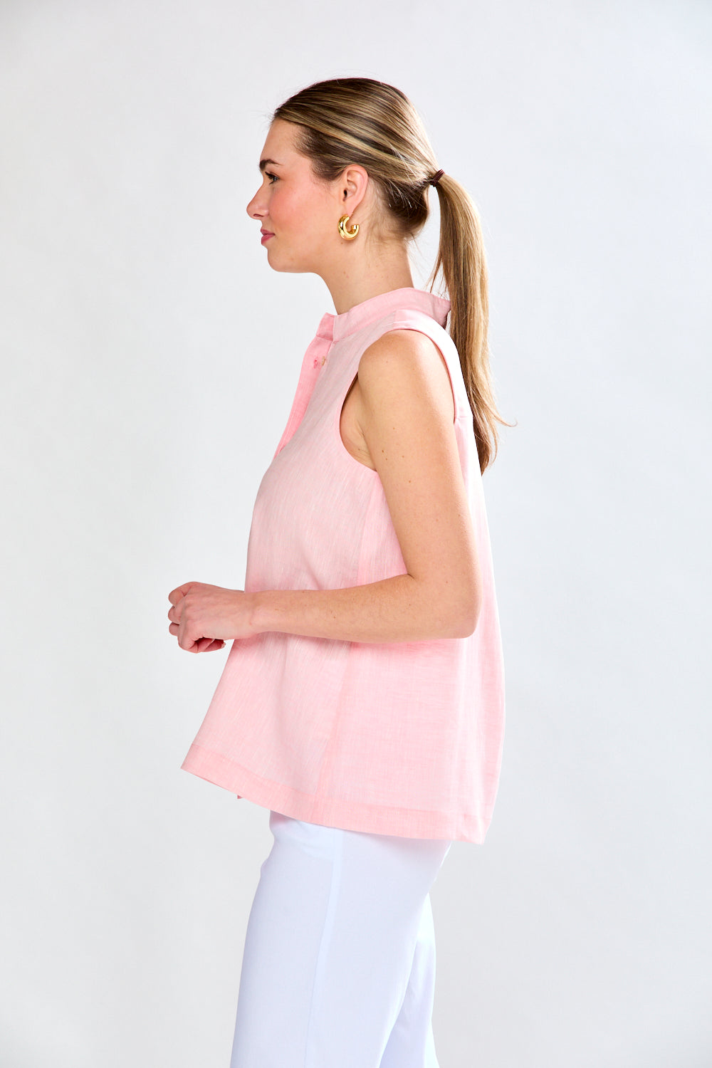 Woman in sorbet linen top