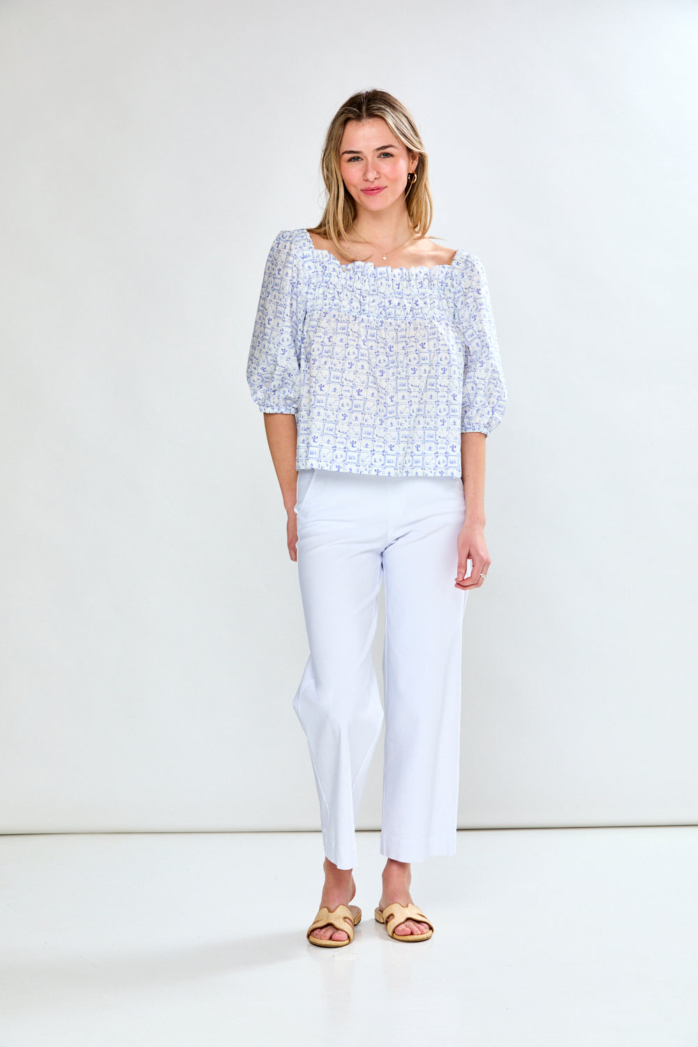 Woman in printed blue top