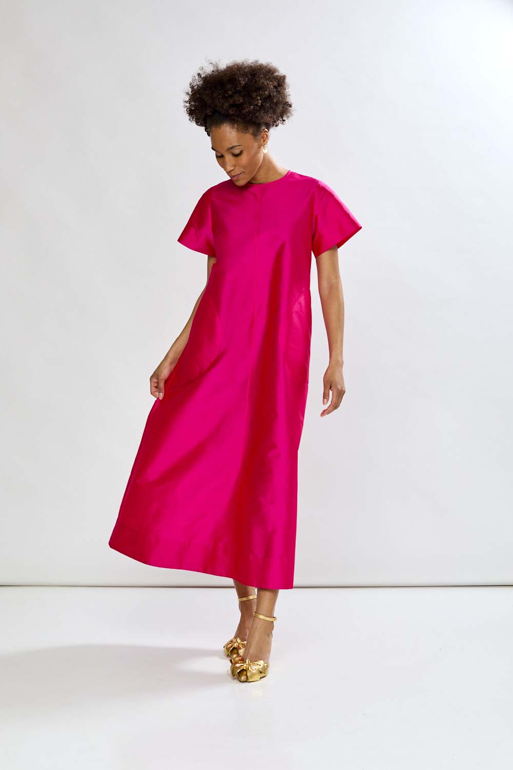 Woman in fuchsia dress 
