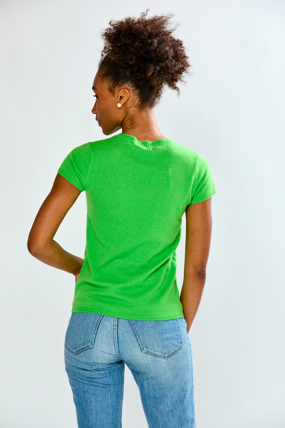 woman in green t-shirt