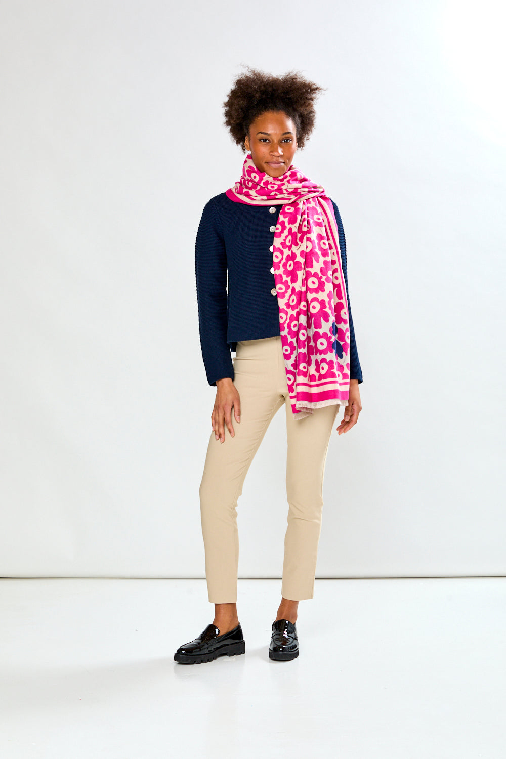 Woman in pink floral scarf