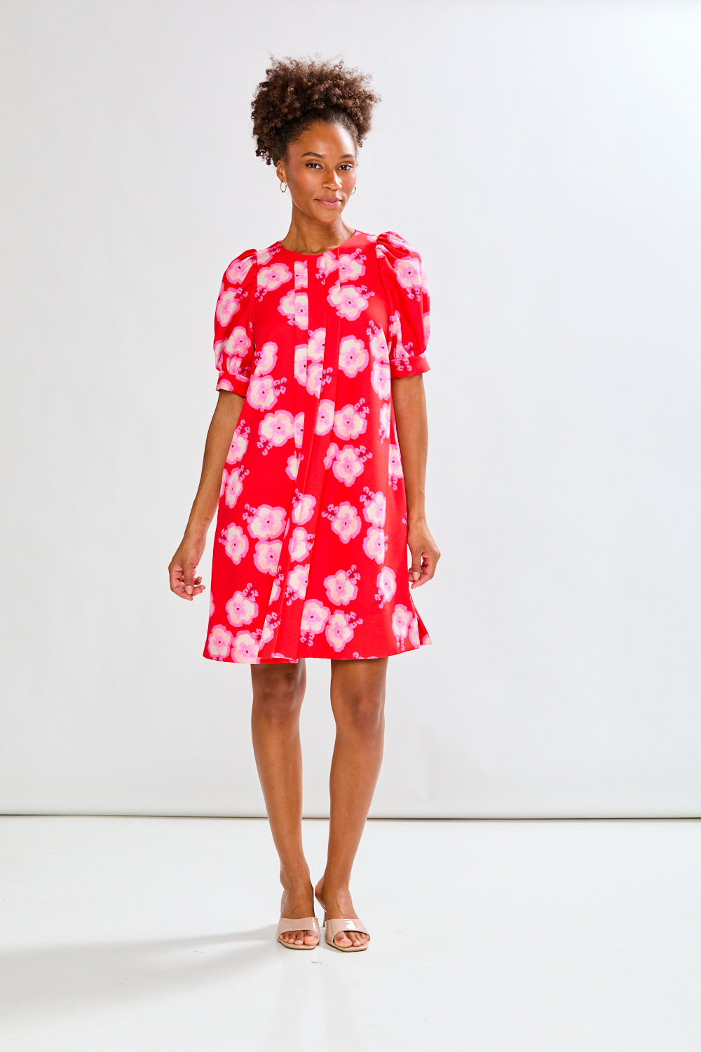 Girl in red dress with flowers