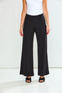 Black wide-leg pants worn by a person on a white background