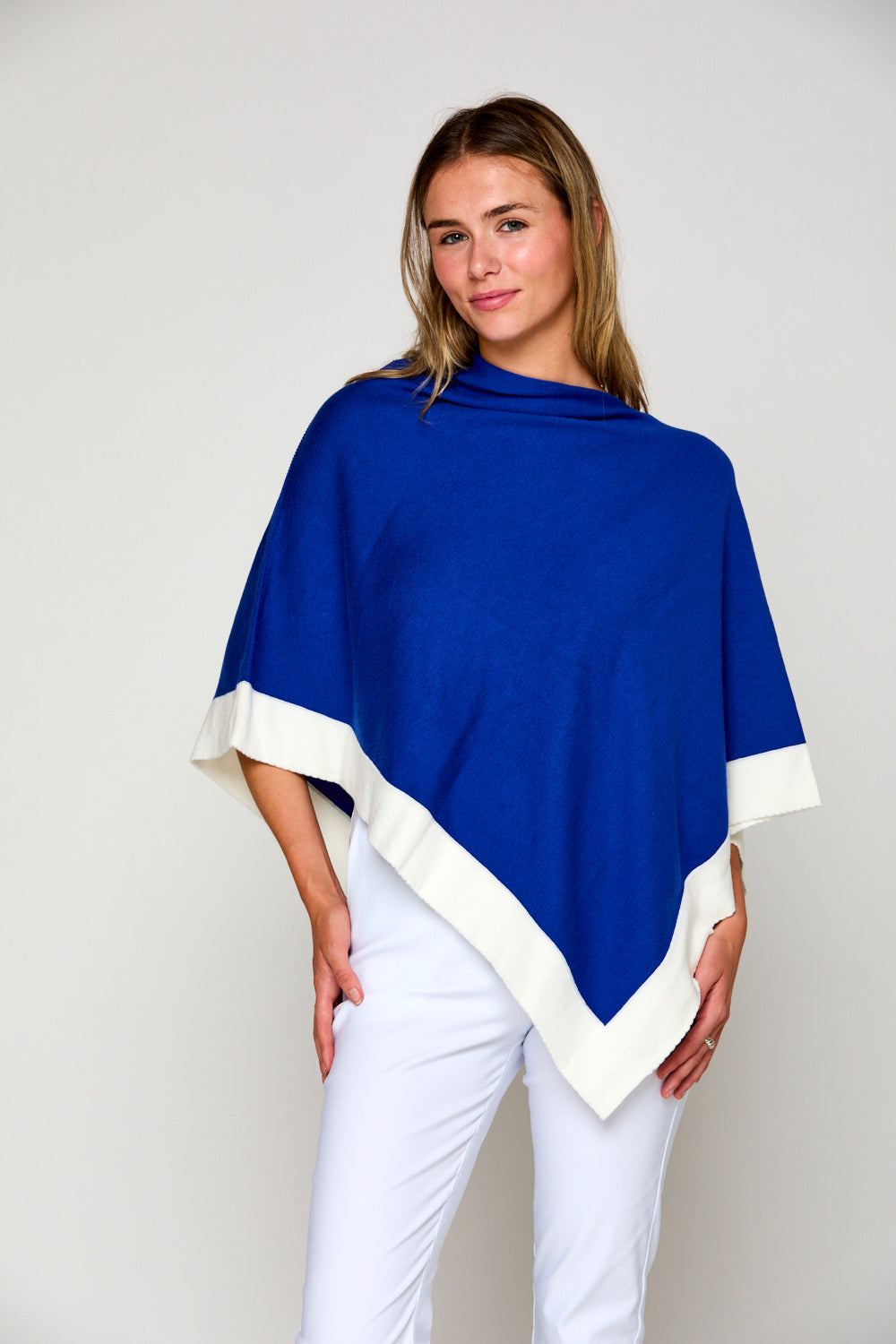 Woman in tipped poncho