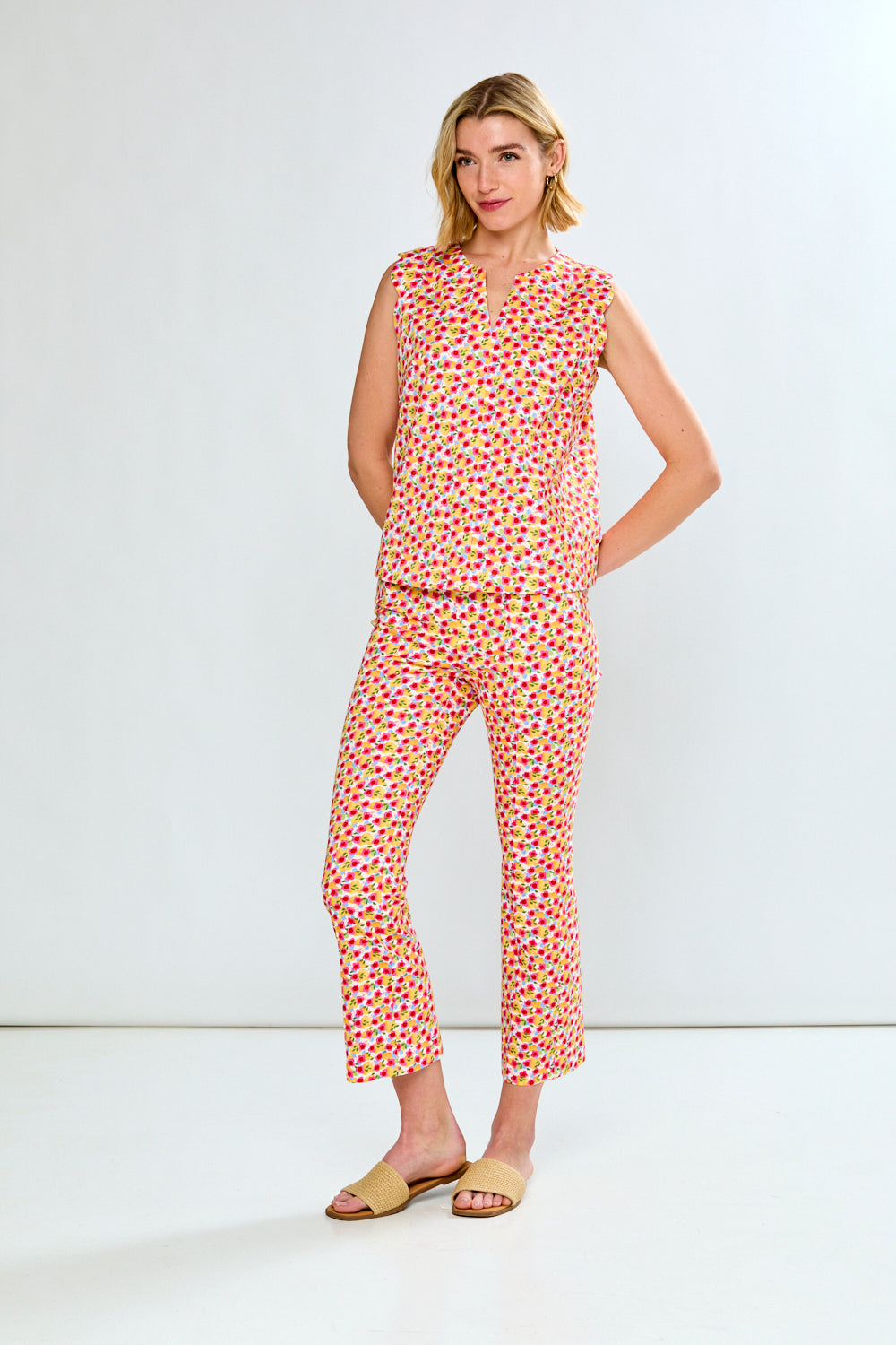 woman in pink floral blouse