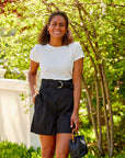 WOMAN IN BLACK HIGH WAISTED SHORTS