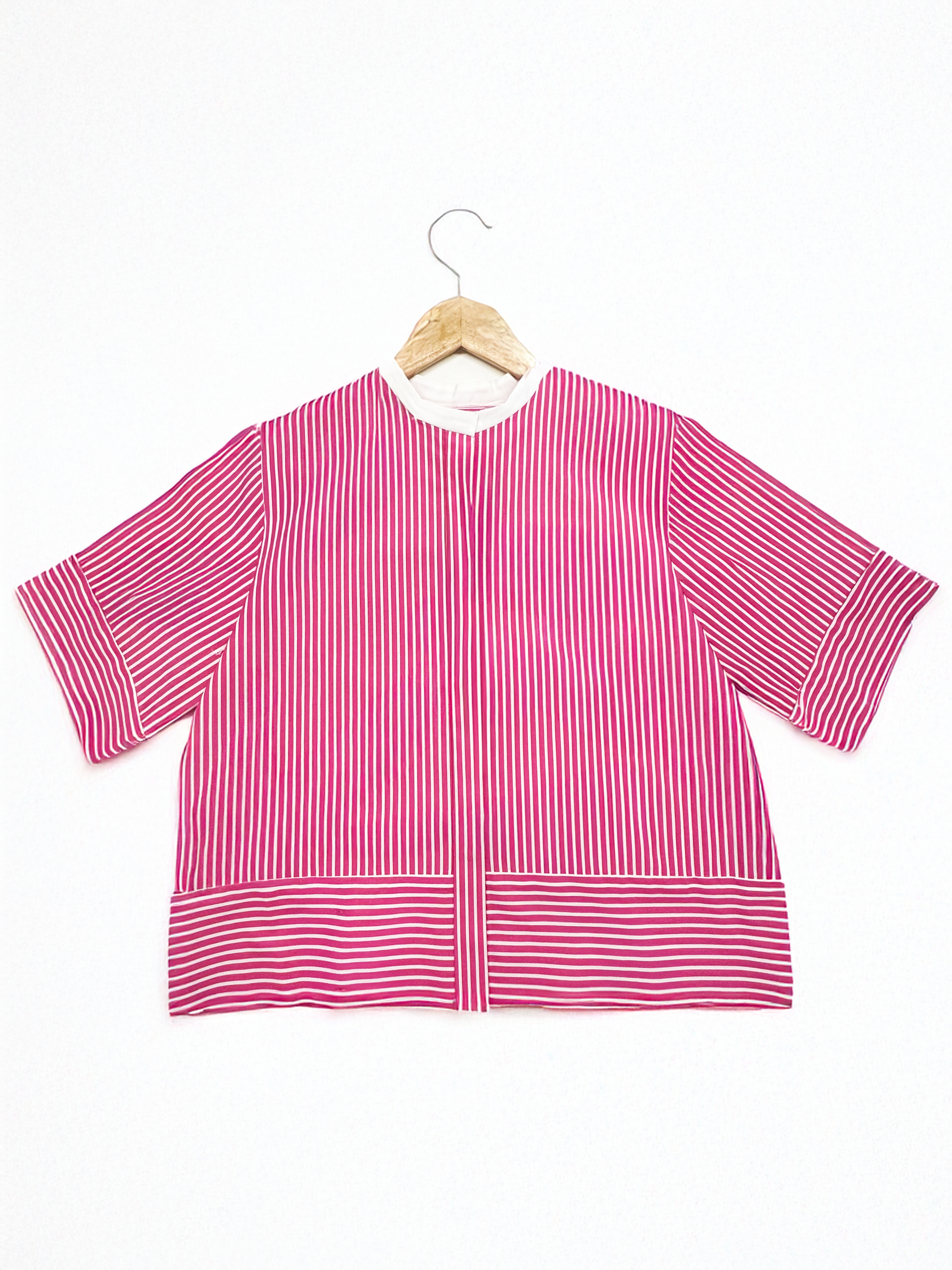 Pink and white striped blouse