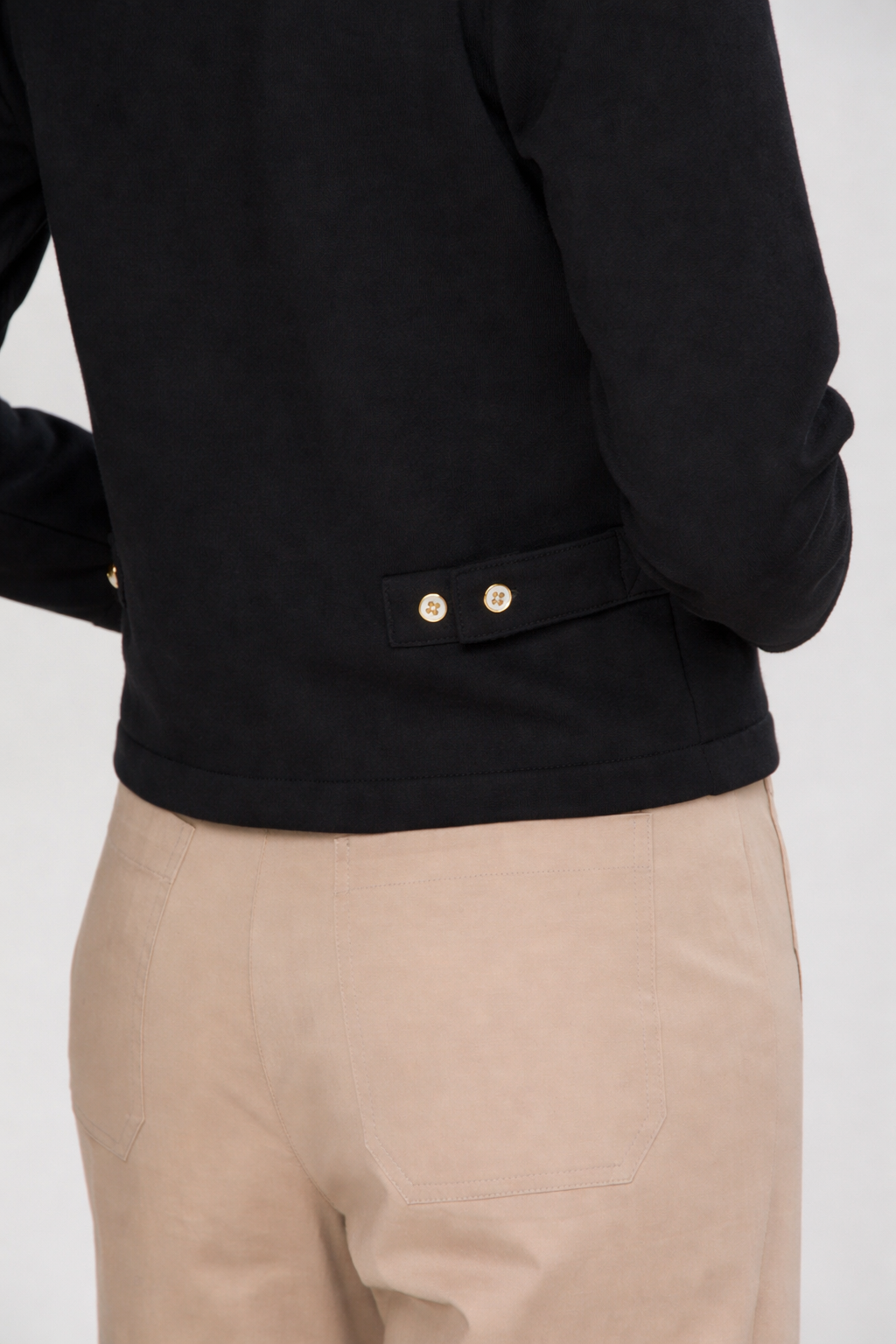 woman in black sweater 