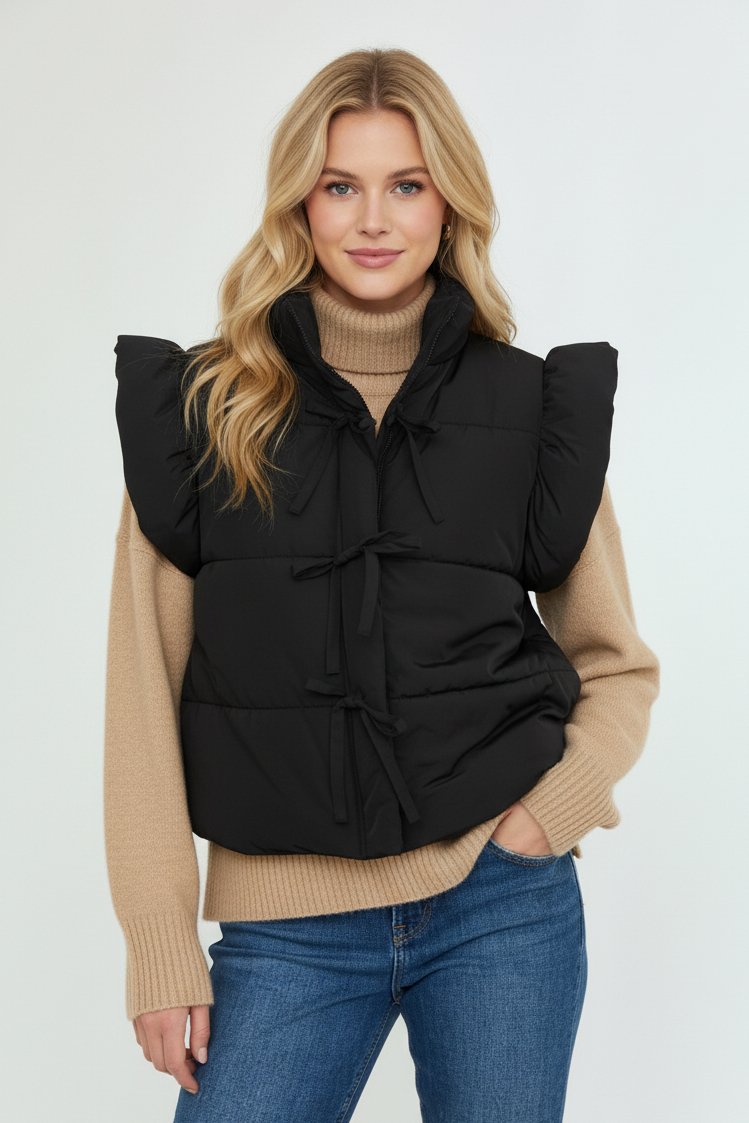 Woman wearing a black puffer vest