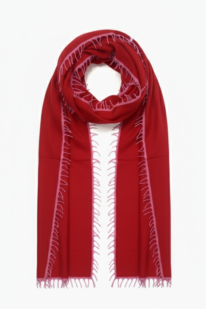 Red scarf with white patterns on a white background