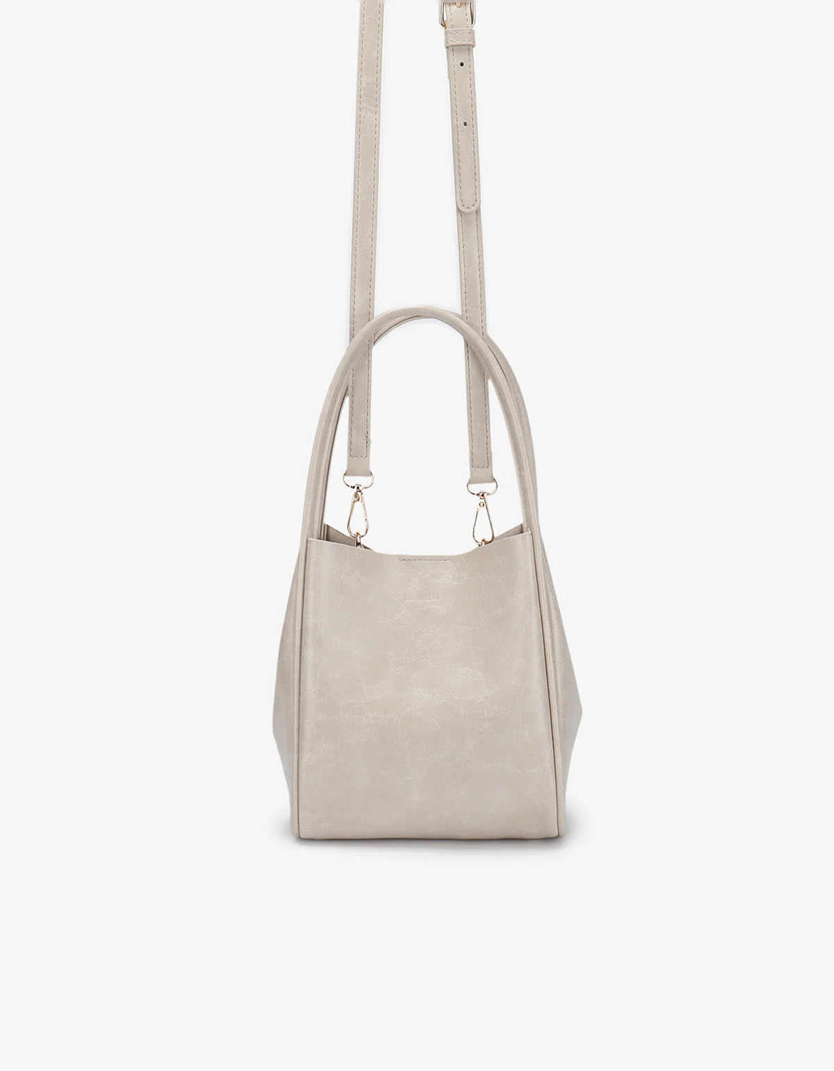 Beige handbag with a strap on a white background