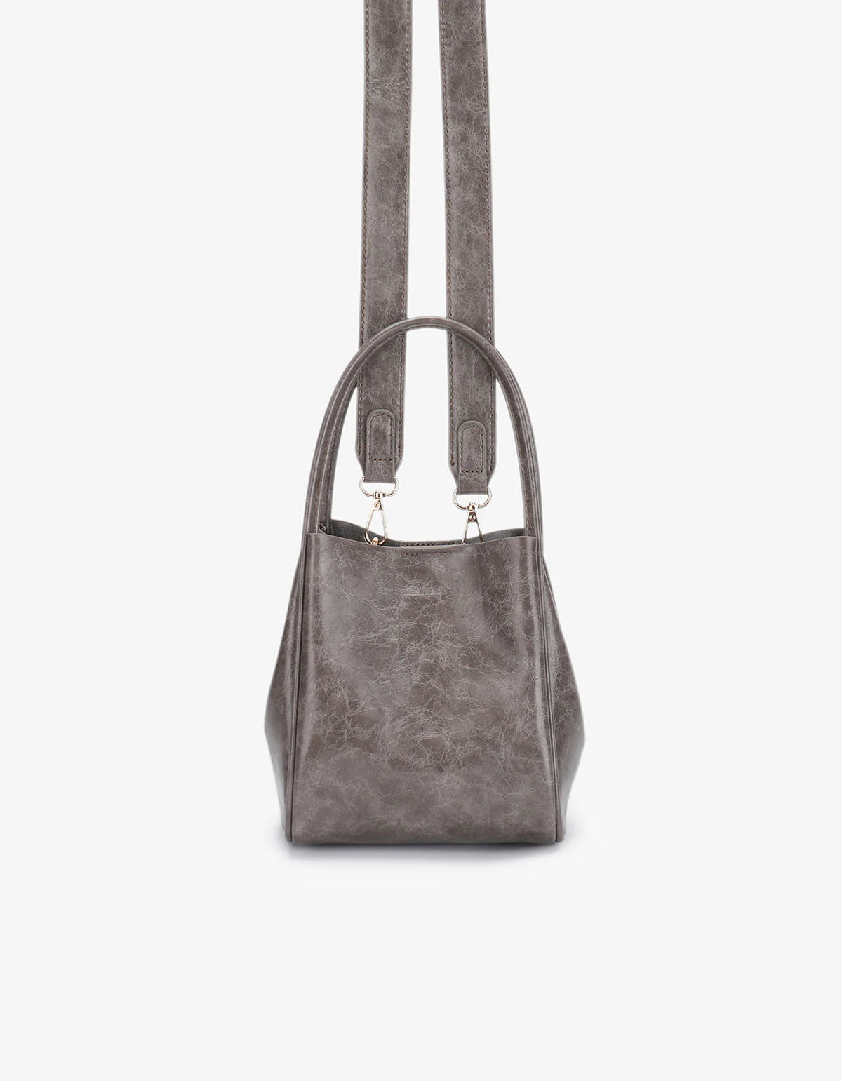 A brown waxed tote handbag with a structured design and dual handles.