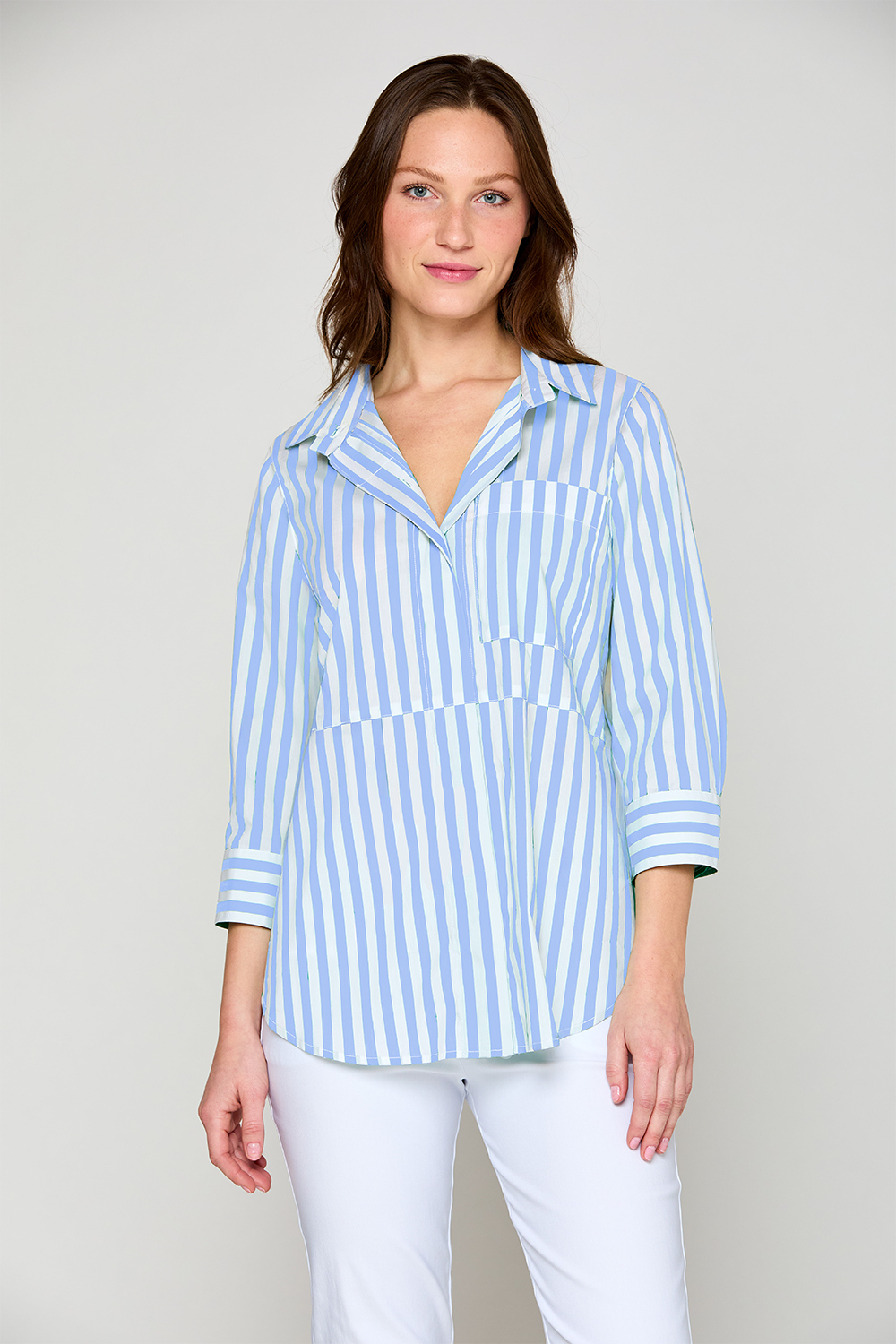 Woman in blue and white stripe blouse