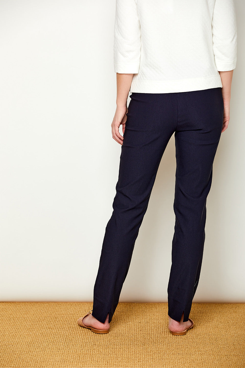 Woman in navy pants