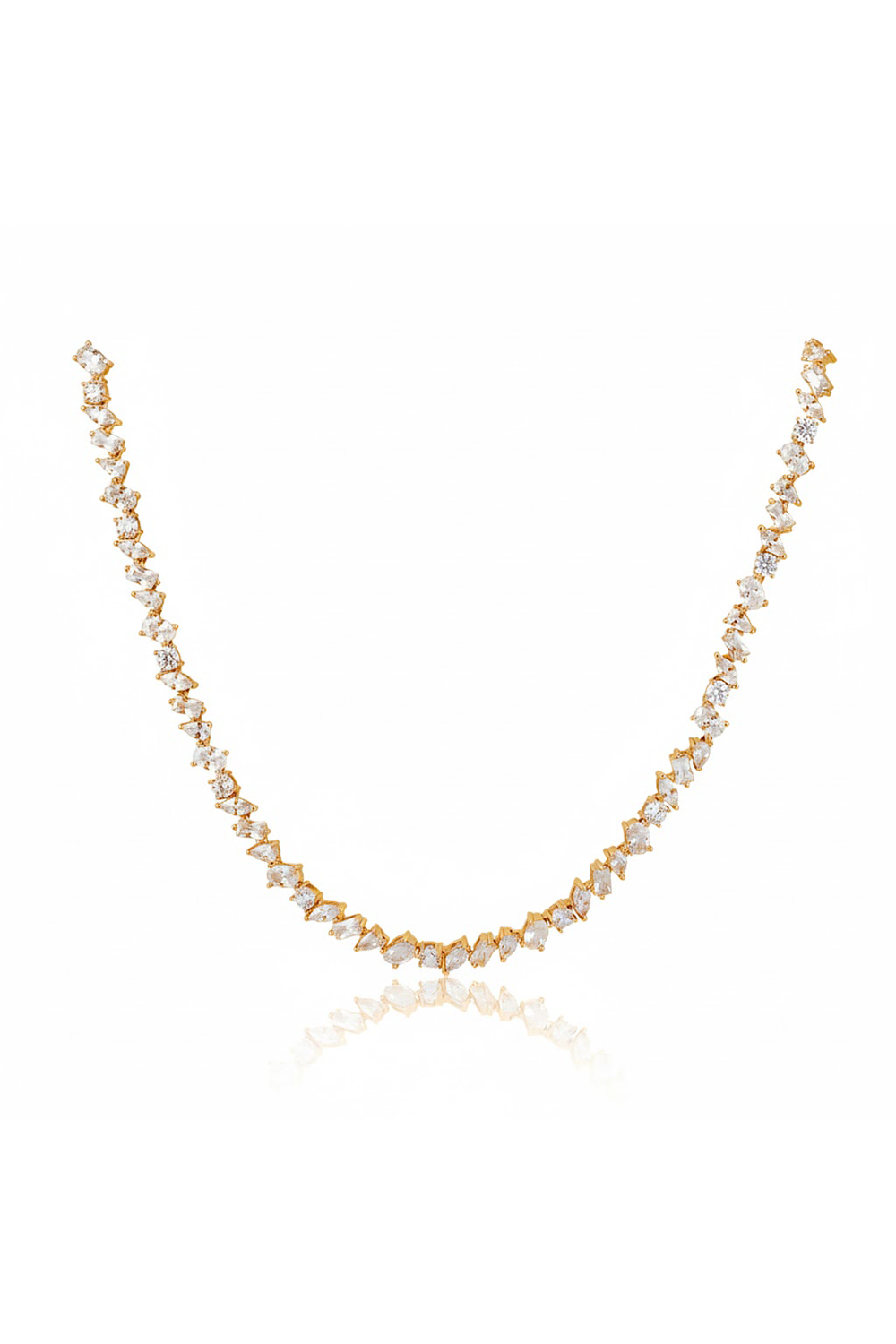 Gold necklace with small pearls on a white background