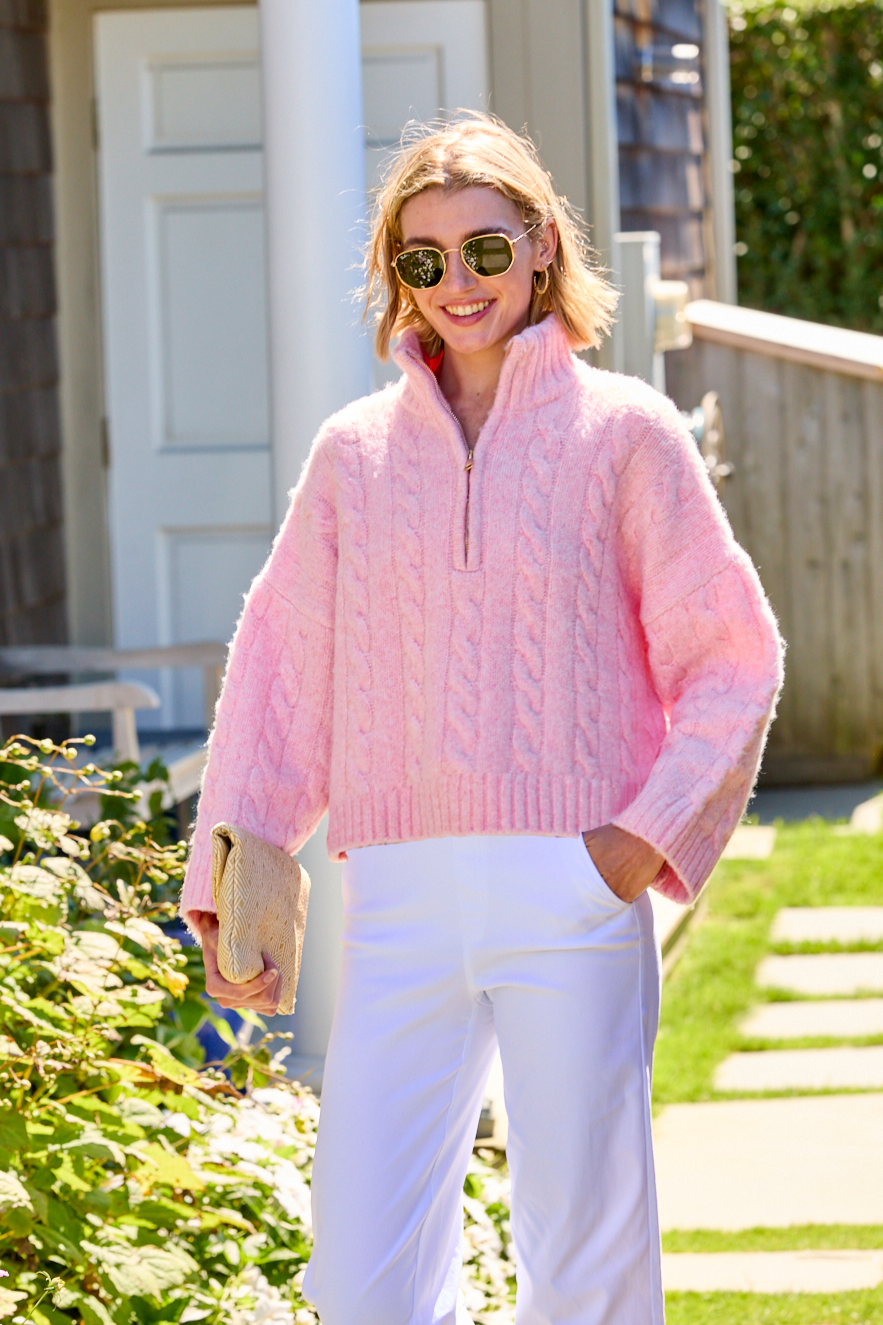 Woman in a pink sweater