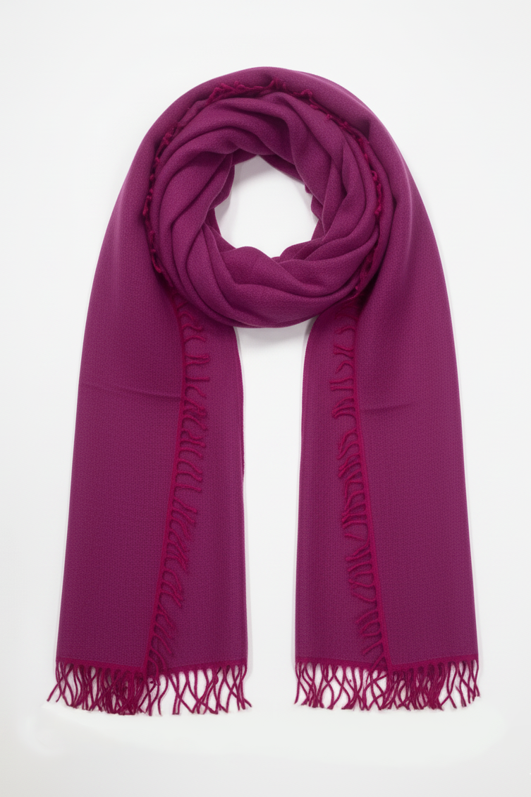 Purple scarf with fringes on a white background