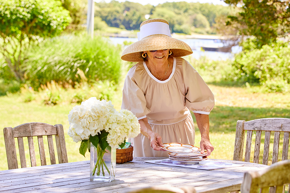 Sara Campbell setting a table