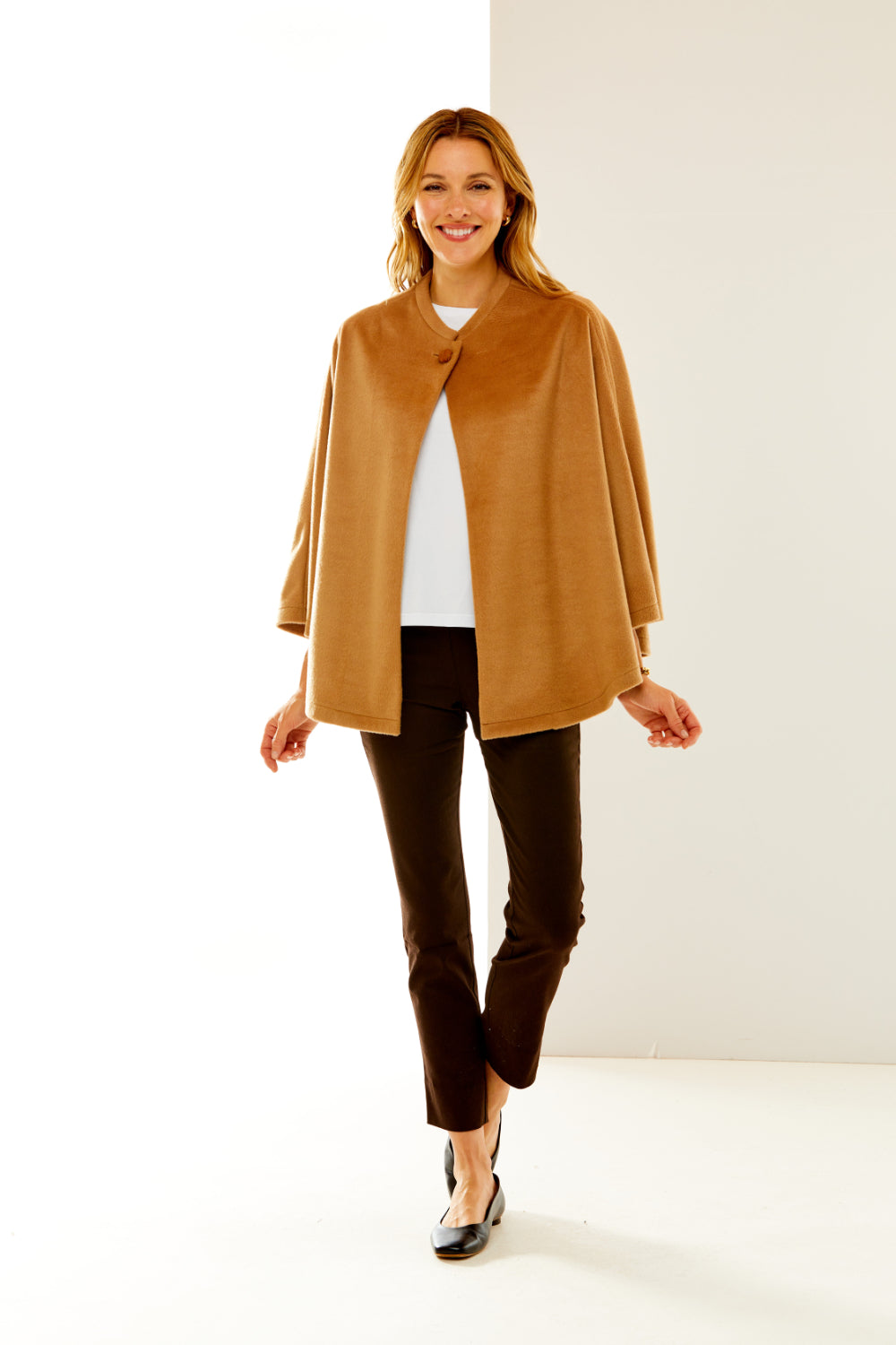 Woman in camel wool cape