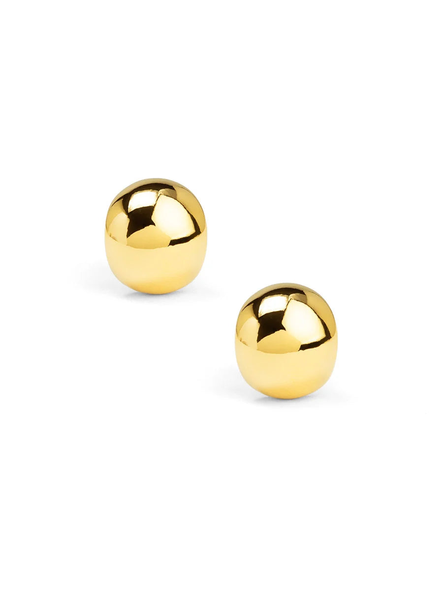 The Polished Dome Ear Clip-On Earring in polished gold with smooth rounded dome shapes displayed against a clean white background for a chic timeless look