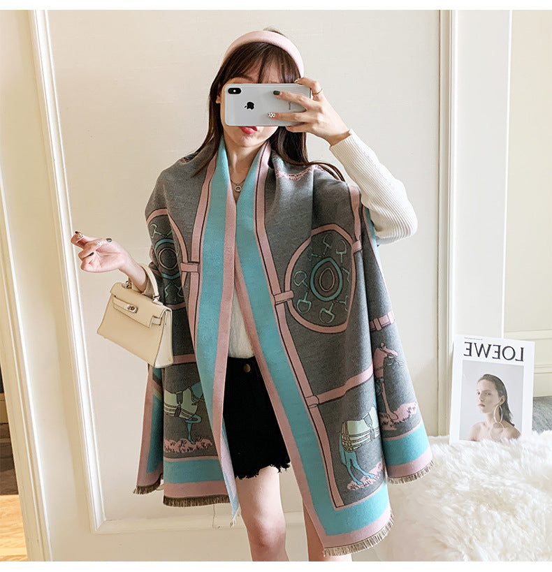 Woman wearing a patterned scarf in a room with a magazine on a surface.