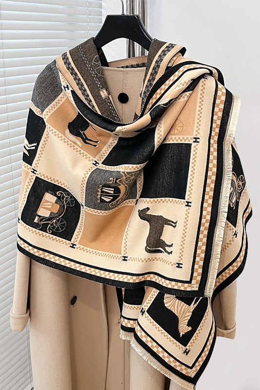 Patterned scarf with black and beige design on a hanger against a white background