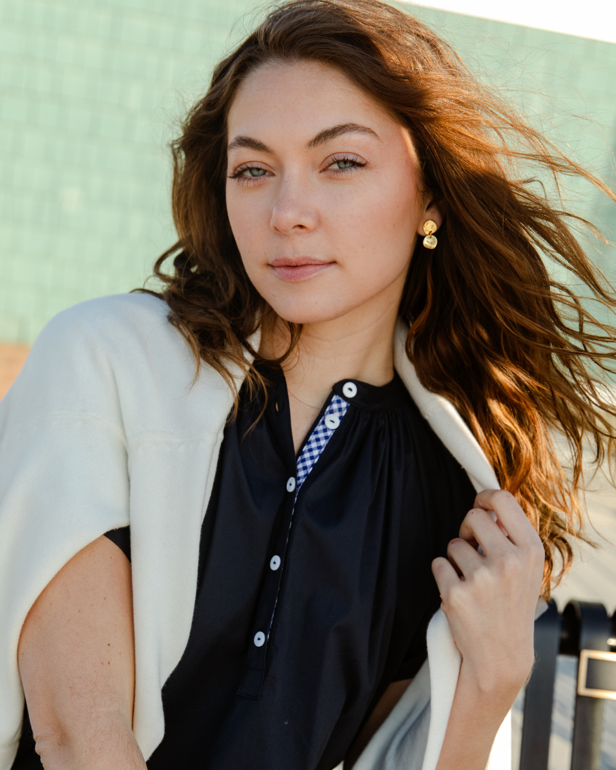 Woman wearing The Medallion Disc Drop Earrings