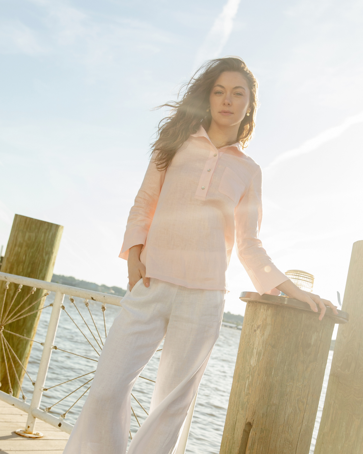 woman wearing short daniella tunic and alessandra pant