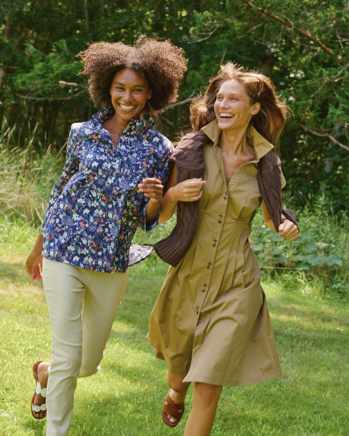 A woman in the Kailyn Dress and a woman in the The Ruffle Collar Short Daniella in Ditsy Floral