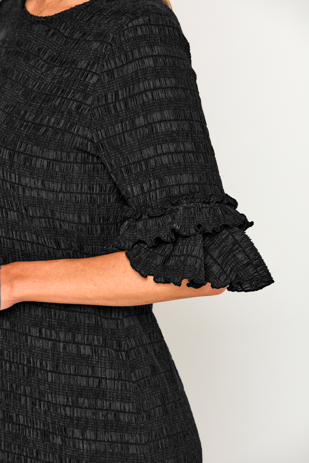 Woman in black dress