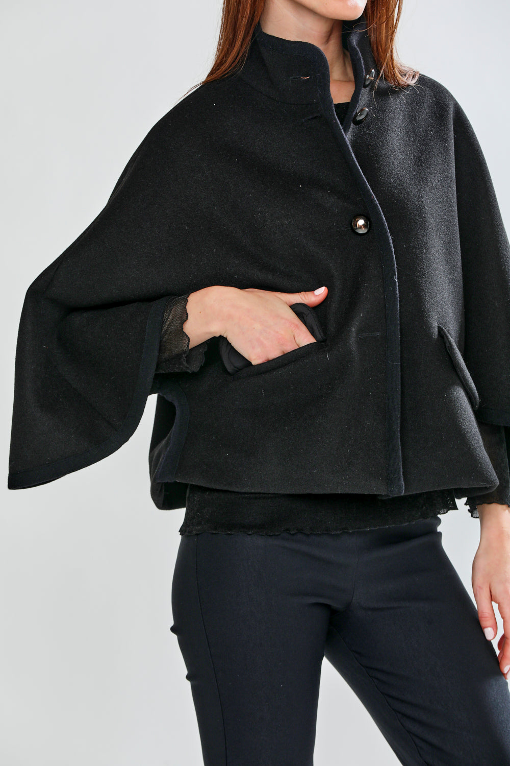 Woman wearing CLAUDIE CAPE - BLACK