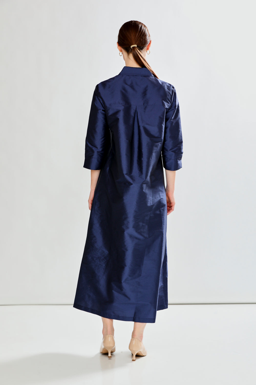 Woman in taffeta dress