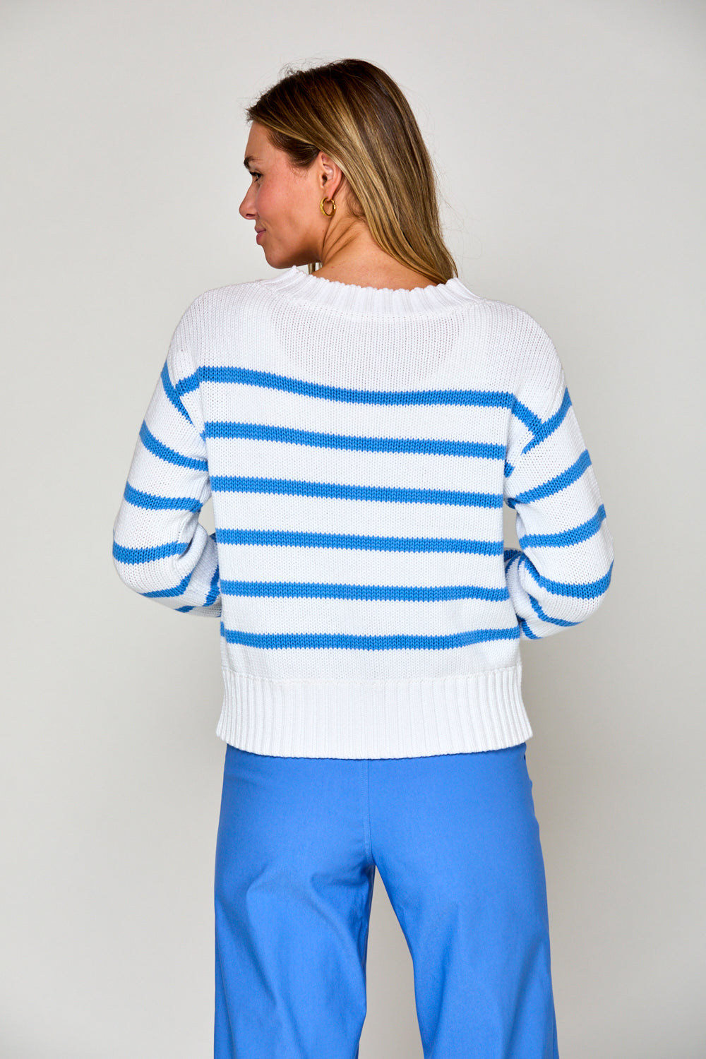 Woman in hydrangea stripe sweater