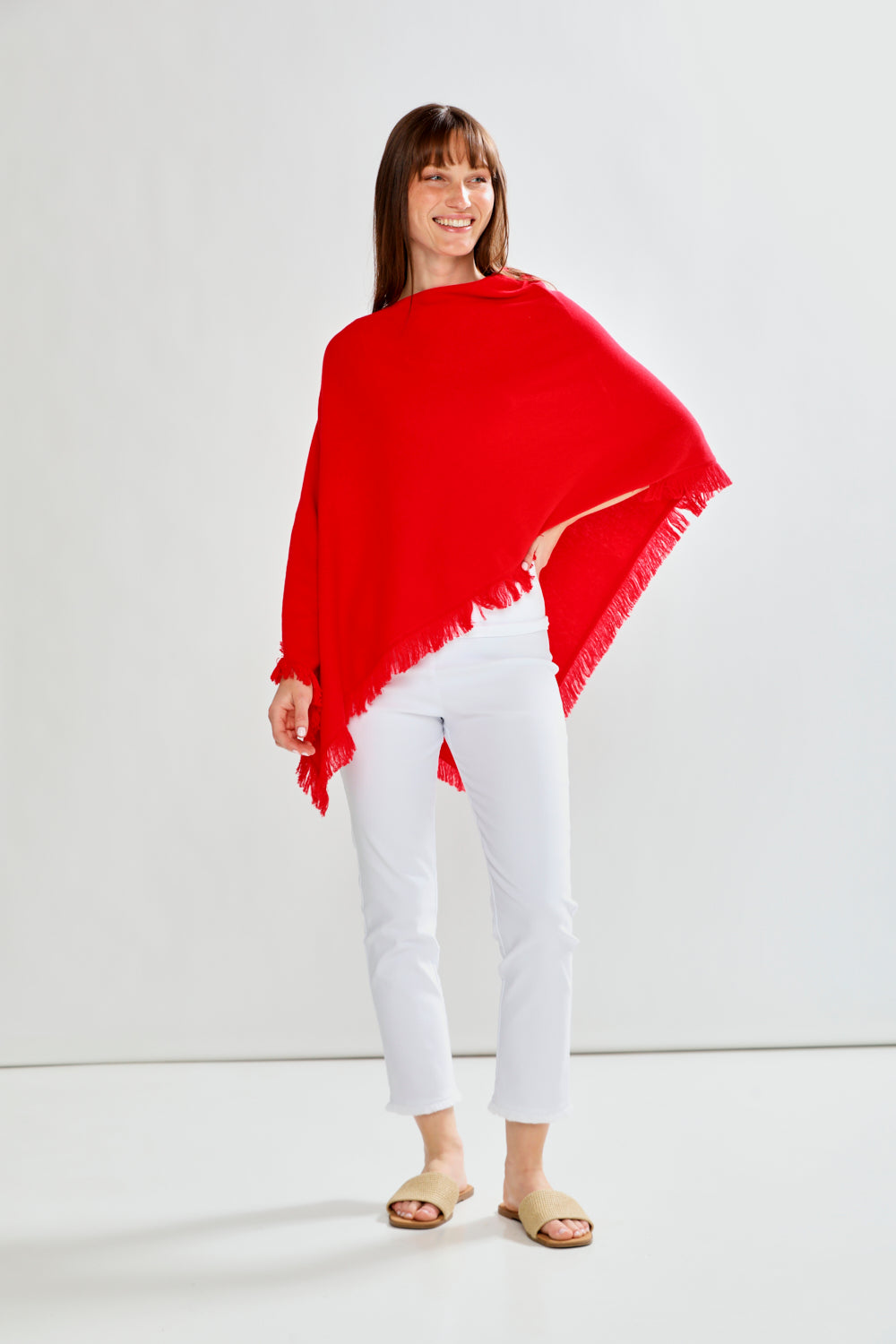 Woman wearing FRINGE RUANA - RED APPLE