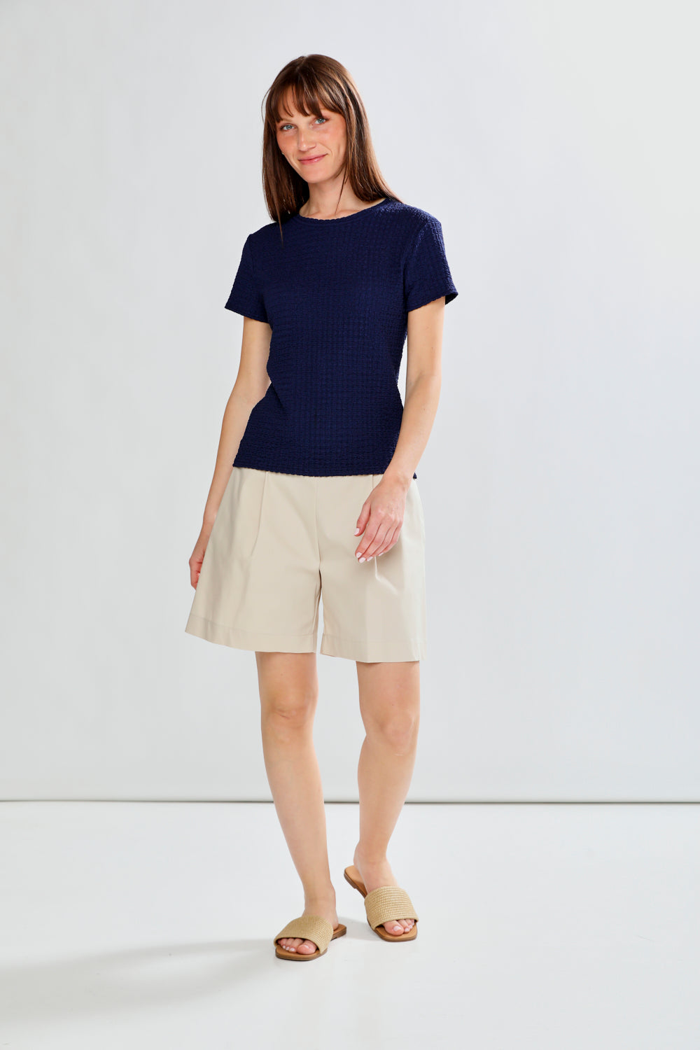 Woman in linen shorts