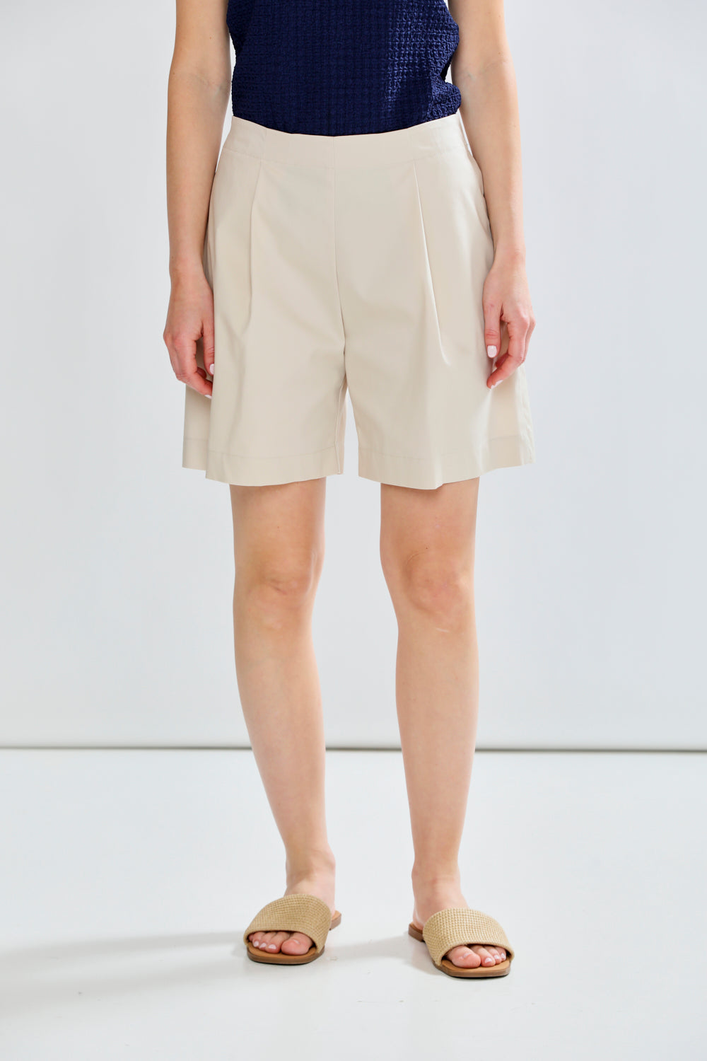Woman in linen shorts