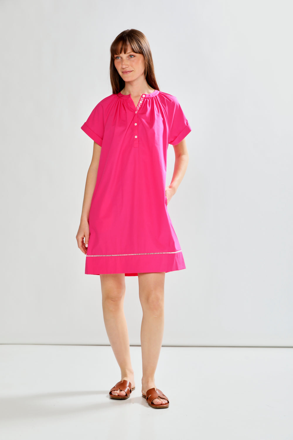 woman in fuchsia dress