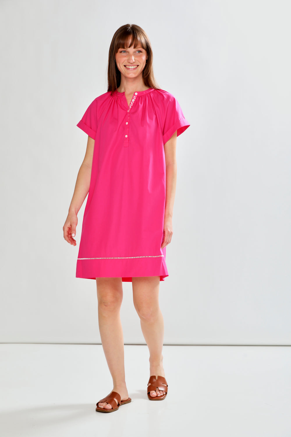 woman in fuchsia dress