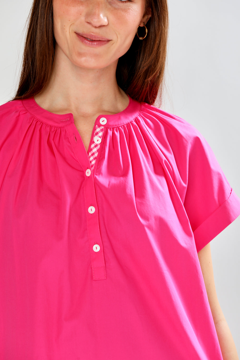 woman in fuchsia dress